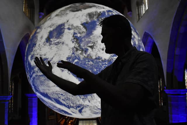 Joop Brouwer leads a tai chi class with Gaia as a backdrop at Lancaster Priory. Picture by Darren Andrews.