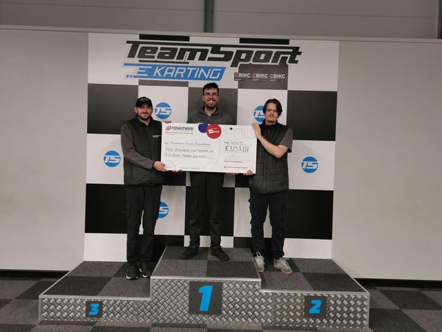 A podium finish for Rosemere Cancer Foundation as Declan (centre) with Liam (left) and Josh take to the winners’ platform to present their awards night donation