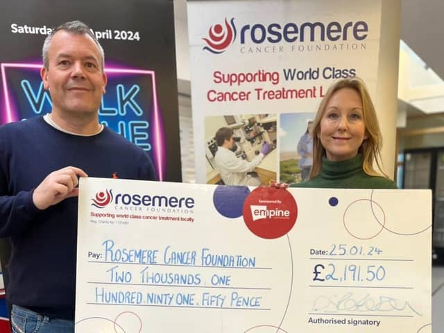 Dave and Tracey with their dancing decs donation for Rosemere Cancer Foundation