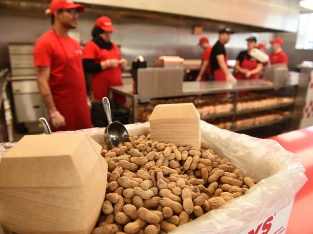 Five Guys offers complimentary peanuts to customers.