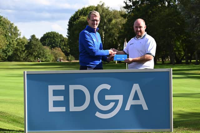 Oliver Hirst-Greenham (right) receives trophy from EDGA President Tony Bennett (photos: The European Disabled Golf Association, our website www.edgagolf.com)