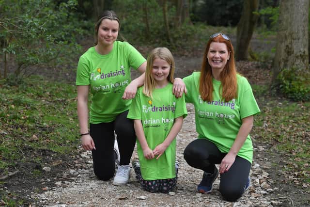 Photo Neil Cross; Penwortham mum Paula Slater and her daughters Scarlet and Charley are walking 21 miles around Ullswater Way to raise money for Derian House. The hospice cared for Paula's daughter Katy Holmes before she died of a rare brain tumour 10 years ago.