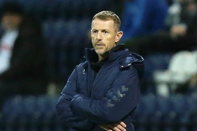 Millwall manager Gary Rowett looks on from his technical area