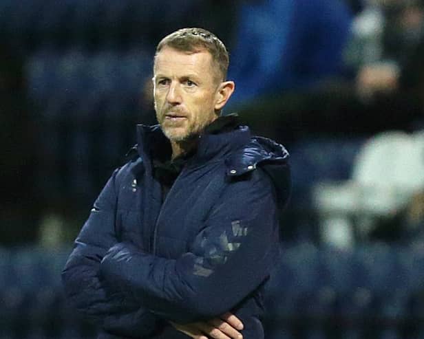 Millwall manager Gary Rowett looks on from his technical area