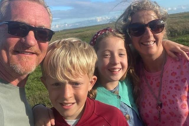 Gareth is congratulated on his achievement by wife Lucy and children Owen, 11, and nine-year-old Julia