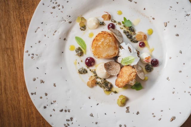 Grilled scallop, cauliflower, grape, truffle and fermented grains