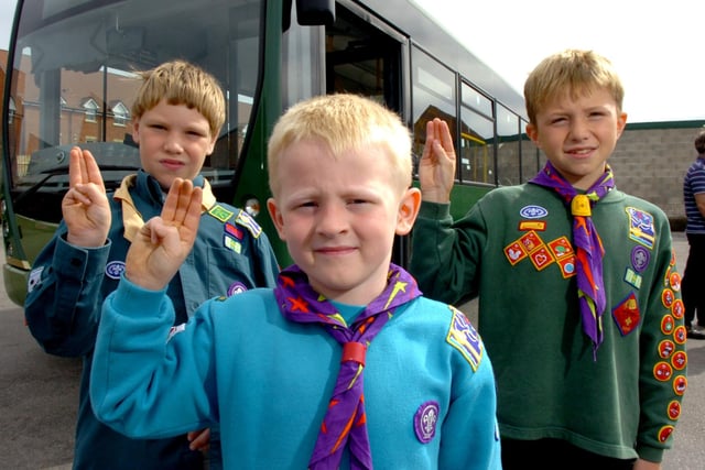 Thomas Astley, Joe Thom and Michael Wilson of Leyland St Ambrose Scouts renew their scout promise aboard a Fishwick Bus in 2007