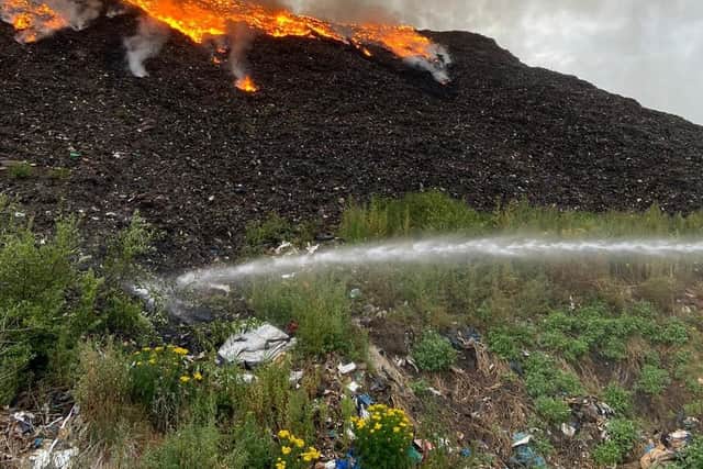 Three fire engines remained at the scene on July 15 to extinguish the flames