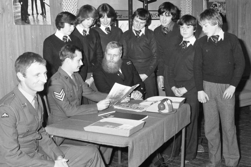 Men of the Royal Navy and Royal Marines gave Preston children a taste of life in the services when they visited Ribbleton Hall High School. Pictured with fourth year pupils are (from left) Marine Andy Christy, Cpl Jumper Collins and Marine Buster Brown