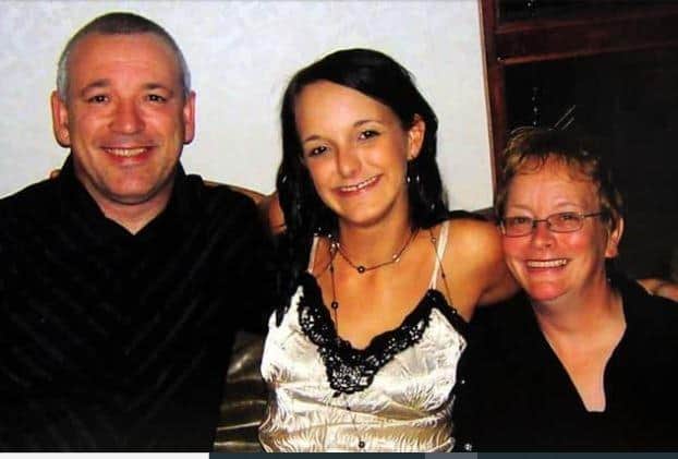 John and Penny Clough with their daughter, Jane, centre, before her death at the hands of her abusive ex