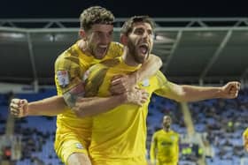 Preston North End's Ched Evans celebrates scoring his side's first goal against Reading with Robbie Brady