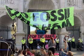 Demonstrators take part in an Extinction Rebellion protest at Marble Arch in central London. Picture date: Saturday April 16, 2022. Rebecca Speare-Cole/PA Wire