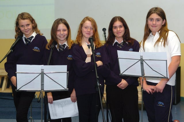 From left, Natasha Hodgett,13, Charlotte Hargreaves,12, Kirsty Warmack,12, Natalie Spark,12, and Rebecca Jarvis,12, during a music demonstration at City of Preston High school