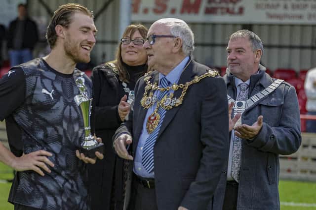 Chorley receive the trophy (David Airey/dia_images)