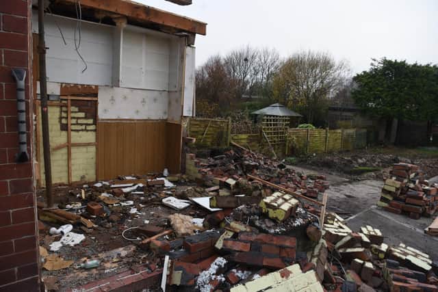 Rubble strewn across the drive of Tony Carey's house