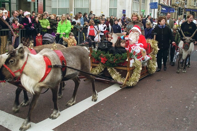 Crowds line the street as Father Christmas tours Preston city centre from the Fishergate Shopping Centre
