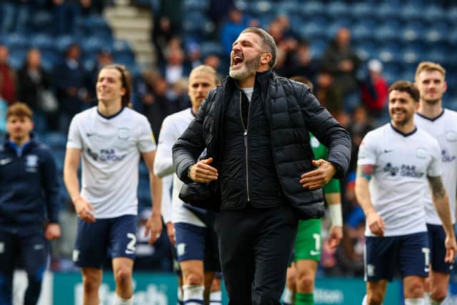 Preston North End manager Ryan Lowe celebrates with fans at the final whistle after the 2-1 win over Reading