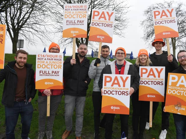 Junior doctors outside the Royal Preston make their case for better pay at the start of their latest strike on 3rd January
