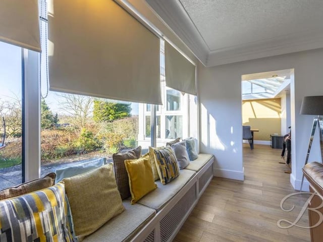 Attached to the living room and leading into the conservatory is this cute and compact sitting room. It overlooks the back garden.