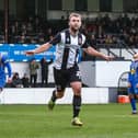 Connor Hall celebrates after scoring from the spot for Chorley (photo: Stefan Willoughby)