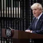 Prime Minister Boris Johnson reads a statement outside 10 Downing Street, formally resigning as Conservative Party leader
