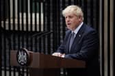 Prime Minister Boris Johnson reads a statement outside 10 Downing Street, formally resigning as Conservative Party leader