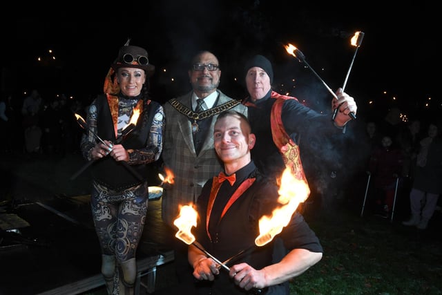 Councillor Yakub Patel, Mayor of Preston, with the talented performers who delighted crowds with their skillful displays of fire-eating