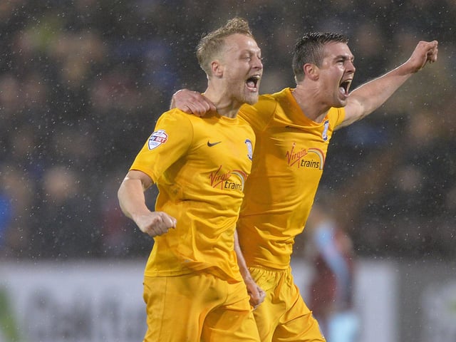 Preston North End's Tom Clarke and Paul Huntington celebrate after Daniel Johnson scored the second goal