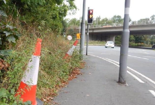 It's claimed that a "chicane" of shrubbery and street furniture is putting school pupils at risk on the A6 Garstang Road approach to the Broughton roundabout from Preston (image:  Matt Hodges)