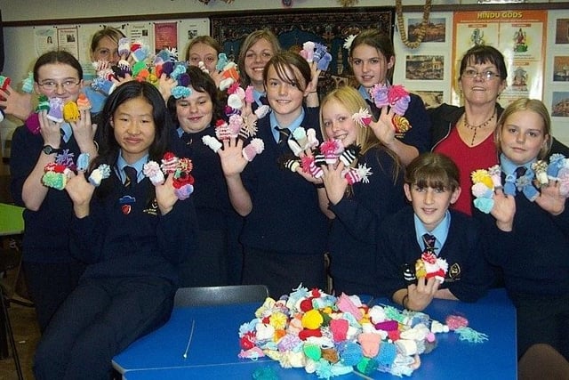 Archbishop Temple youngsters with their knitted tops which are set to adorn Innocence Smoothies drinks, raising money for various different charities