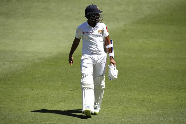 BRISBANE, AUSTRALIA - JANUARY 26: Roshen Silva of Sri Lanka looks dejected after being dismissed by Pat Cummins of Australia during day three of the First Test match between Australia and Sri Lanka at The Gabba on January 26, 2019 in Brisbane, Australia. (Photo by Ryan Pierse/Getty Images)
