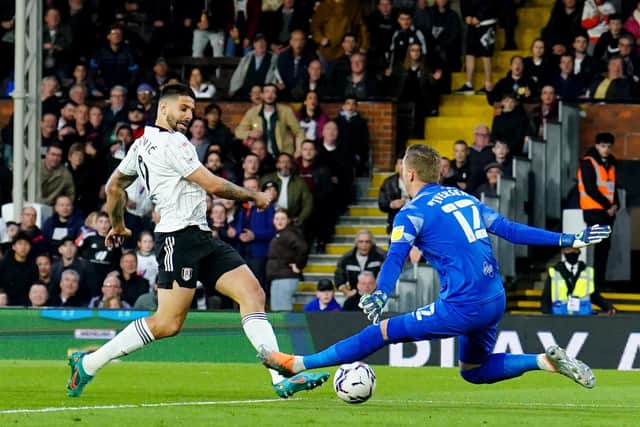 Fulham's Aleksandar Mitrovic scores the opening goal against Preston North End at Craven Cottage