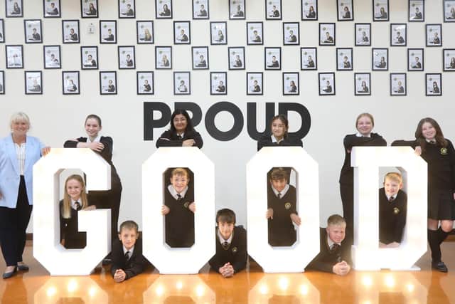 Headteacher Sharon Asquith with pupils. Image: Paul Kelly