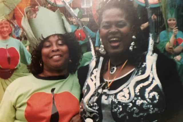 Maxine, left, celebrating her Jamaican heritage at the Preston Caribbean Carnival