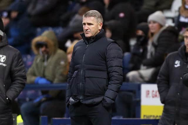 Preston North End manager Ryan Lowe looks dejected as he watches from his technical area