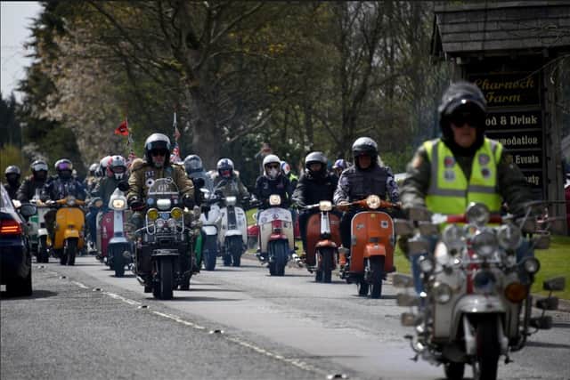 Scooter devotees show off their prized machines in a mass ride-out.