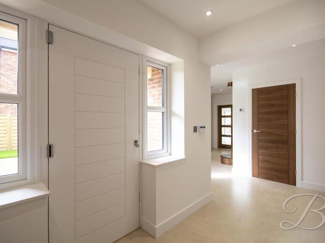Even the entrance hallway is spacious and boasts a touch of luxury.