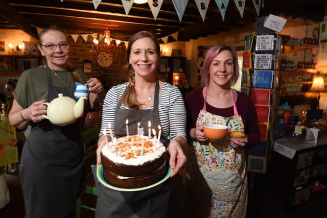 Charlie Hutton (pictured centre) celebrates a decade in business at Potters Barn cafe.She is pictured with staff members Toni Sabben, left, and Amy Irwin, right.