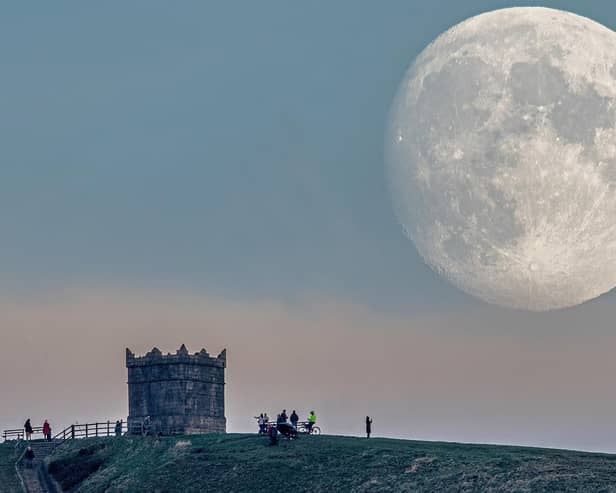 A full Beaver Moon rising over Rivington Pike (Photo taken by Lee Mansfield)