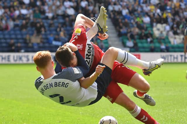 Sepp van den Berg and Paddy McNair involve themselves in a slam dunk during Preston North End's win against Middlesbrough in May