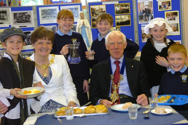 Lea St Mary's Primary celebrates its 150th anniversary. Pictured are pupils (from left) Marcus Knight, seven, Amy Parr, 11, Isaac Ibison, nine, Grace Parkinson, eight, and Declan Sweeney, nine, serving lunch to Preston Mayor Coun Albert Richardson and Mayoress Sheila Crook