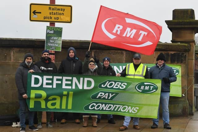 RMT pickets on duty outside Preston Station today.