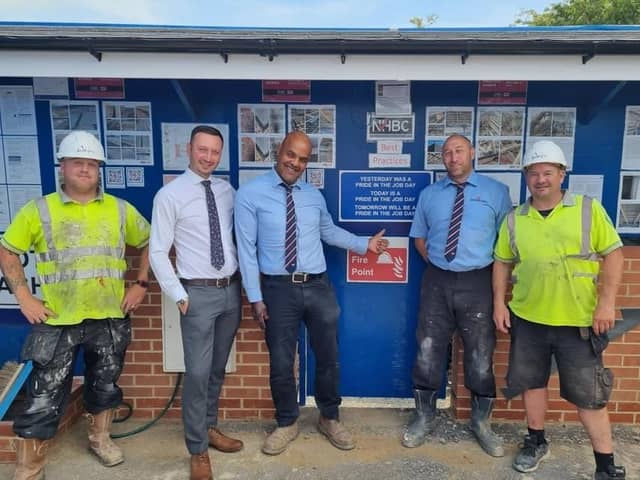 Wain Homes site manager Ken Bruney (centre), pictured with construction colleagues from Wain Homes’ Kingsley Manor development