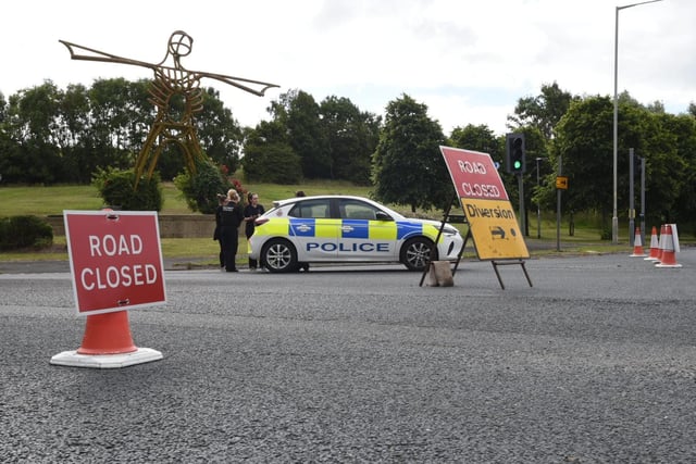 Dawson Lane was closed in both directions and people were urged to seek alternative routes.