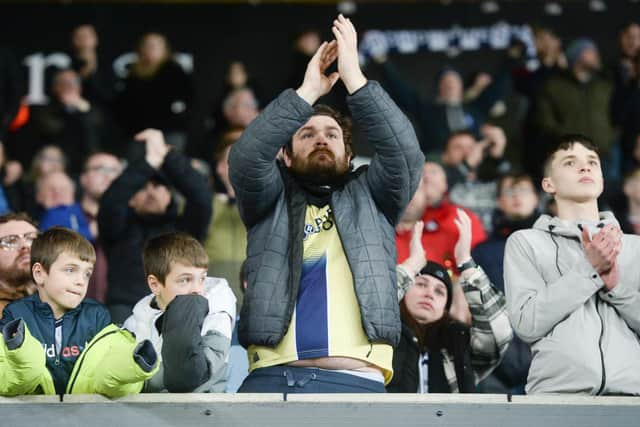 North End fans applaud the team at the final whistle