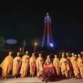 The lighting up of Blackpool Tower in red and white colours