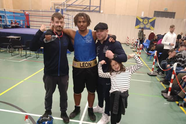 Leon Hughes, centre, became the Over 92kg champion at the England Boxing Youth Championships