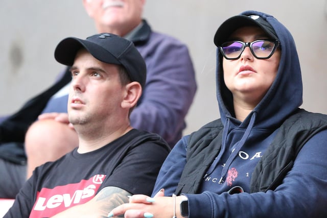 Two North End fans look quite tense before the game.