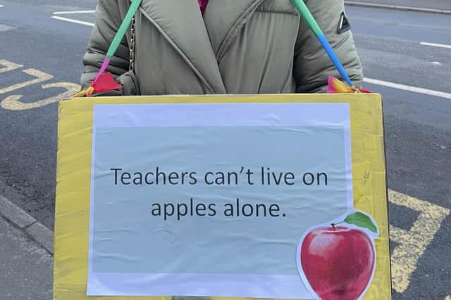 "Teachers can't live on apples alone" sign outside Parklands High School in Chorley
