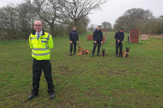 Andrew Snowden with some of the dog handlers at the Hutton HQ